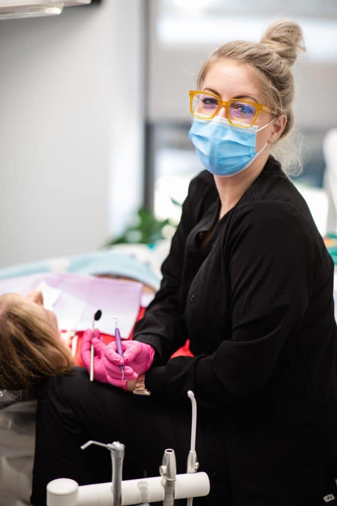 Makenzie with a patient at McKinney-Graham Dental Arts Hickory NC