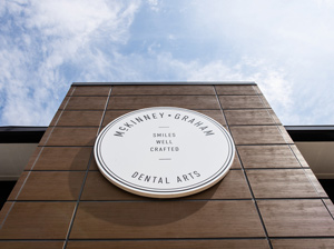 Exterior sign of McKinney-Graham Dental Arts, open weekdays for emergency dental care