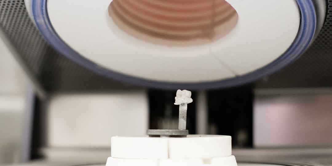 CEREC milling machine creating a same-day dental crown